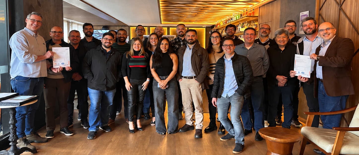 AUMUND Brazil team celebrating ISO 9001:2015 certification